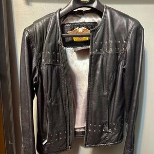 Harley Davidson woman’s biker jacket 
Has been kept pristine!